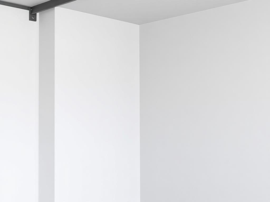 After repair: crisp new drywall corner in the garage with even texture and fresh light gray paint